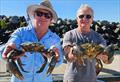 Wayne and his mate with a couple of big bucks caught in the chill of winter