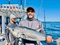 Jibin enjoyed the battle with this chunky longtail caught offshore on a Double Island Point Fishing Charter