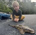 Hudson having a great time catching fish in his home waters of the Burrum