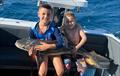 A lap full of cobia had the Brown brothers smiling on a recent trip out wide