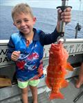 Young Leo Arnold loves getting out with dad, Aiden, and has already witnessed reef fishing many adults only dream of