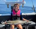 Tarj with a lap full of cobia from a recent reef fishing mission
