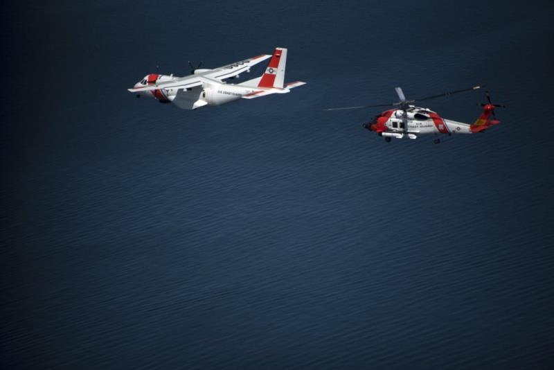 A Coast Guard Air Station Cape Cod HC-144 Ocean Sentry aircraft and an MH-60 Jayhawk helicopter fly over Newport, Rhode Island, Tuesday, May 8, 2018. The aircraft flew over Coast Guard Cutter Eagle as part of the opening of the Volvo Ocean Race village. - photo © Petty Officer Andrew Barresi / U.S. Coast Guard