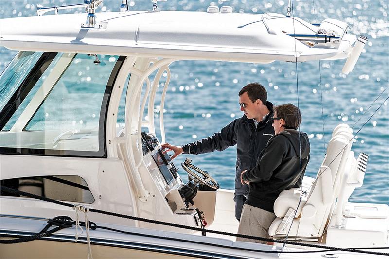 Handover time and a full run through, especially of all the electronic systems many customers add to their new Grady-White vessels. - photo © Short Marine