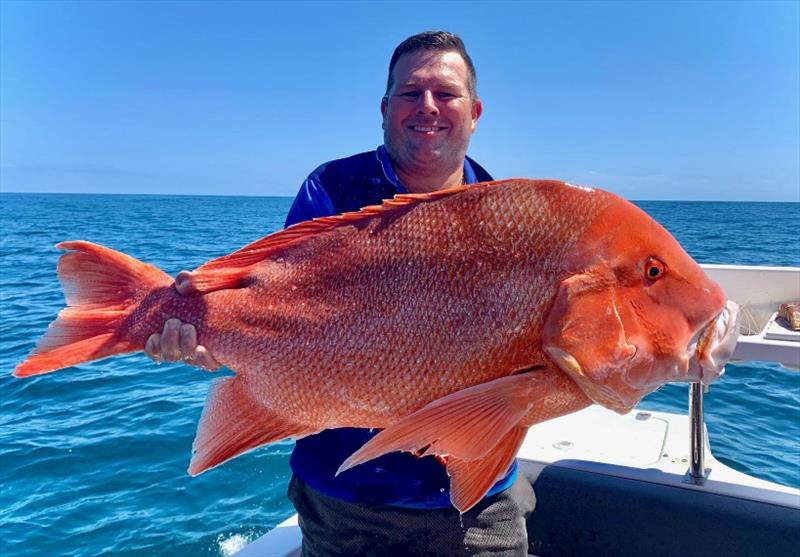 Brett Bartlett with an estimated 16-18kg red emperor, a sensational catch that was released to fight another day - photo © Fisho's Tackle World