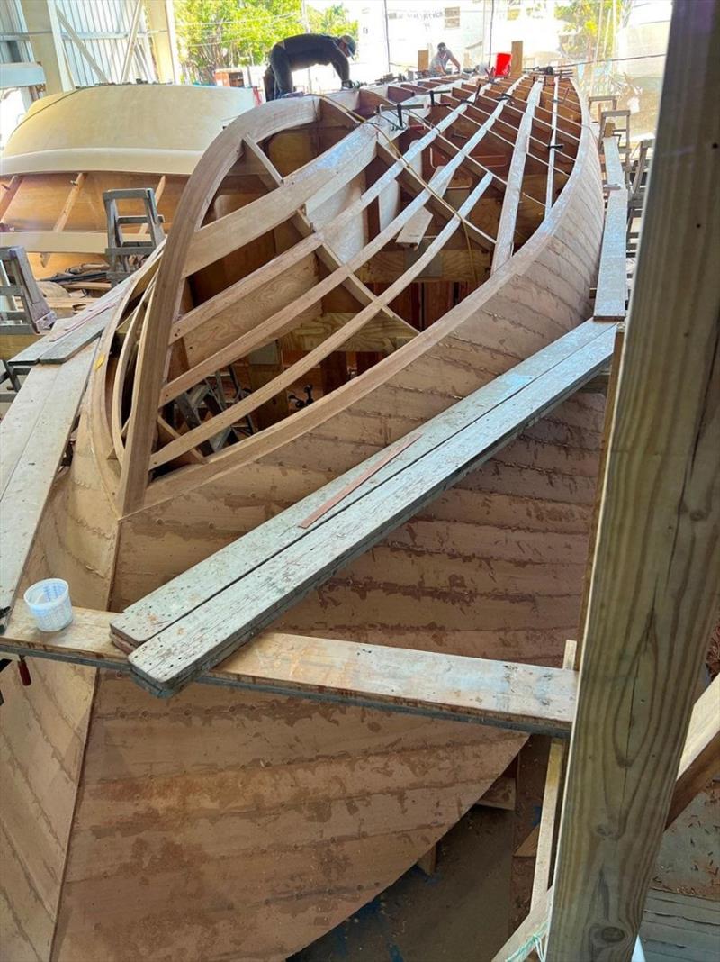 Hull #8 Faired bottom before planking - photo © Michael Rybovich & Sons