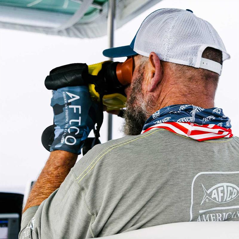 Sun protection fishing gloves photo copyright AFTCO taken at  and featuring the Fishing boat class