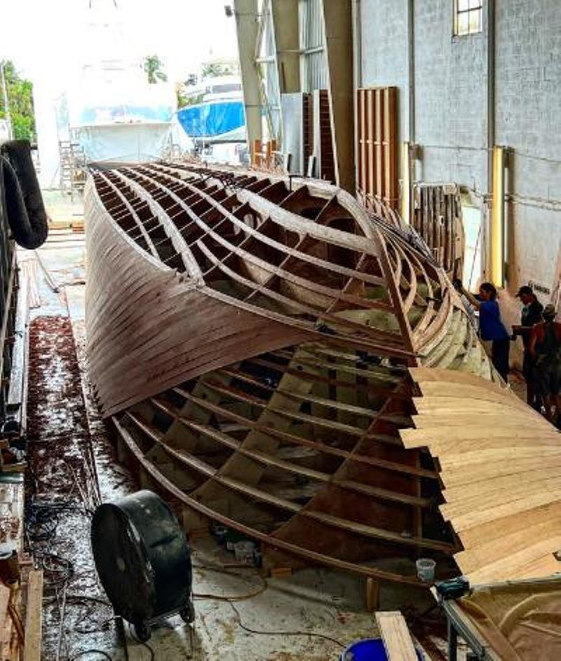 Hull #9 - Fitting first side layer - photo © Michael Rybovich & Sons
