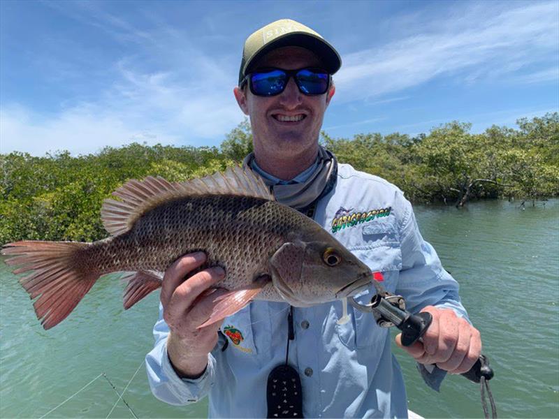 Sam Cass with a nice mangrove jack caught on a Zman Diezel Minnowz photo copyright Fisho's Tackle World taken at  and featuring the Fishing boat class