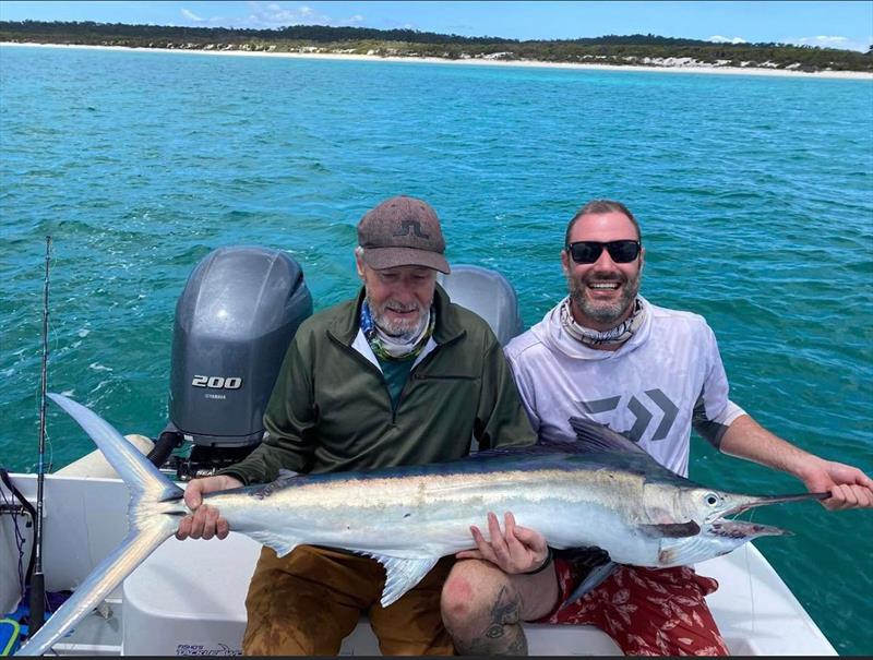 Joup and his Dad with a juvenile black marlin caught with Hervey Bay Fly & Sportfishing photo copyright Fisho's Tackle World taken at  and featuring the Fishing boat class