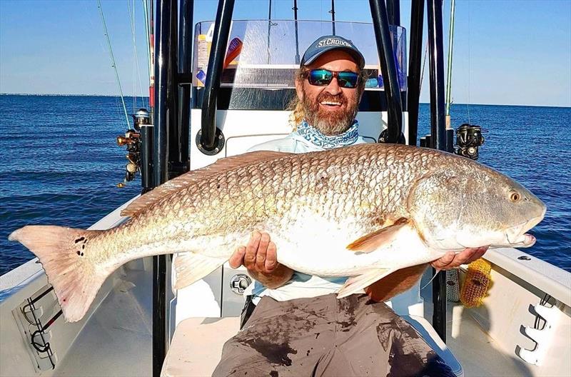 Captain Justin Carter on Atlantic-coast redfish and bonus cobia photo copyright St. Croix Rods taken at  and featuring the Fishing boat class