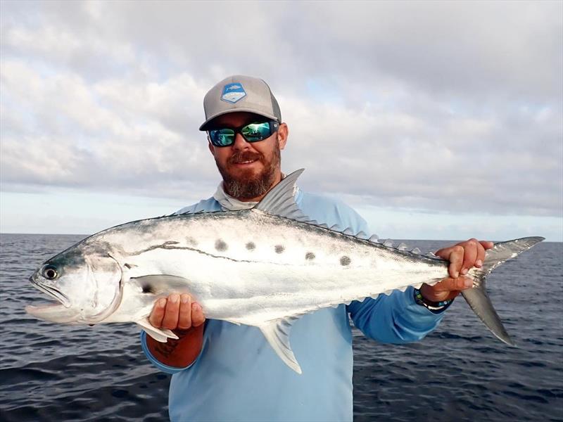 Nath with a queenfish caught on an outing with Tri from Fraser Guided Fishing - photo © Fisho's Tackle World