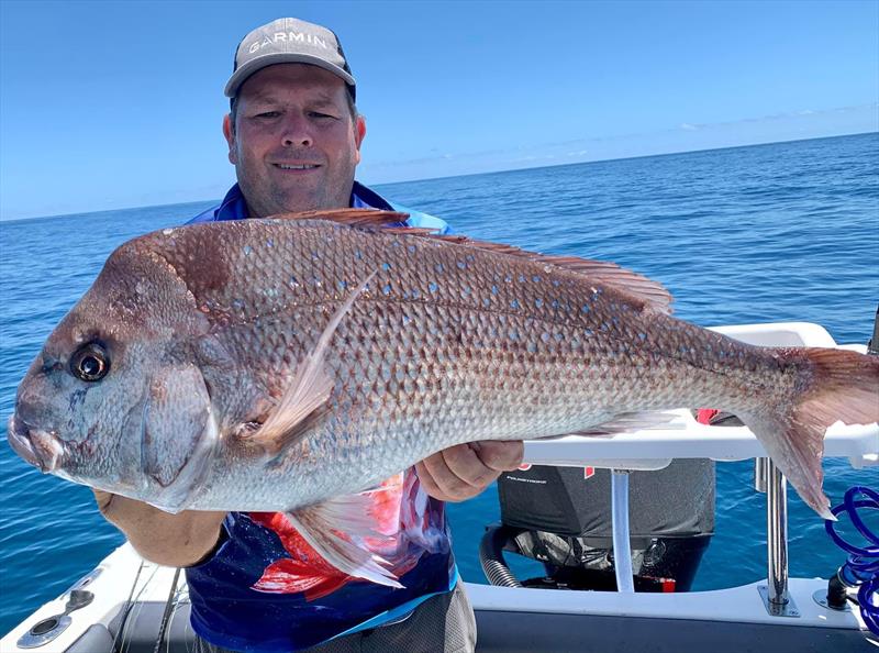 Brett with a ripper summertime snapper - photo © Fisho's Tackle World