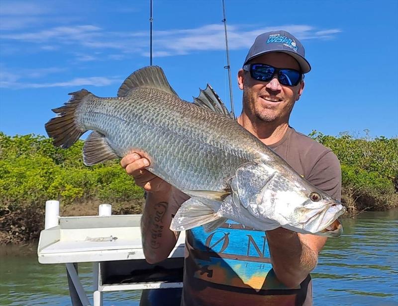 Pauly from Hot Reels Pro Fish Charters with a nice Salty barra whilst enjoying a guides day off. And what else would he do besides go fishing - photo © Fisho's Tackle World