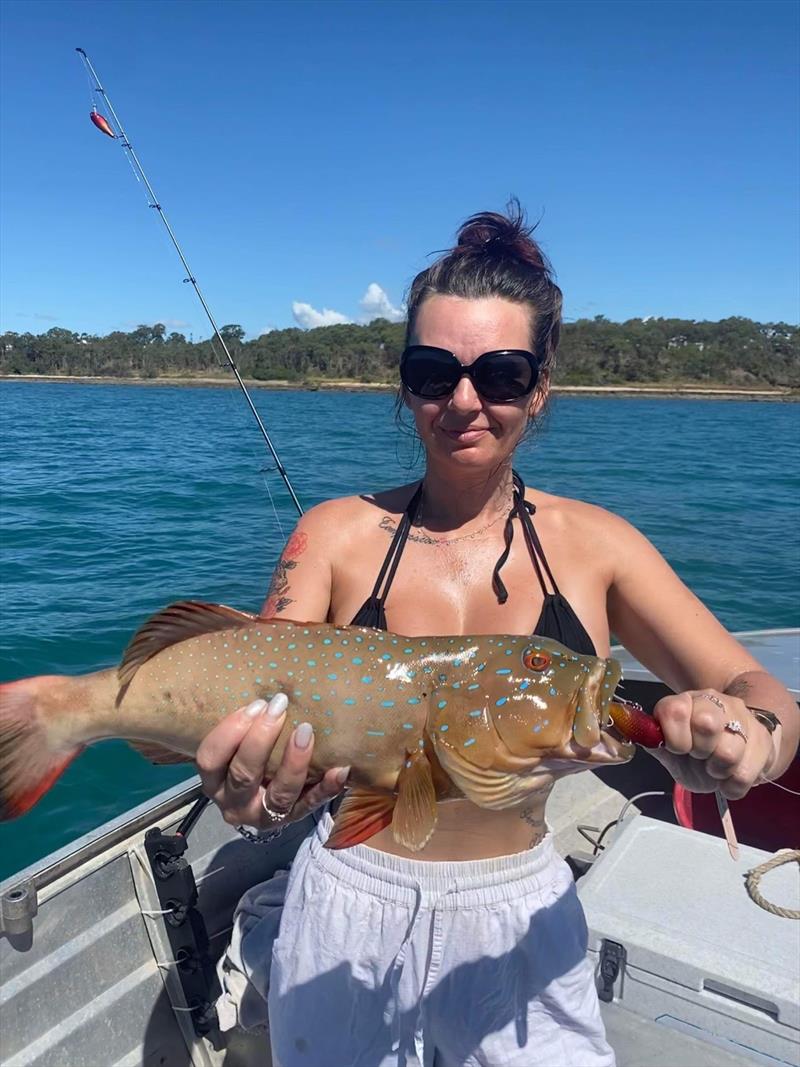 Mel's still trolling up trout in the shallows - photo © Fisho's Tackle World