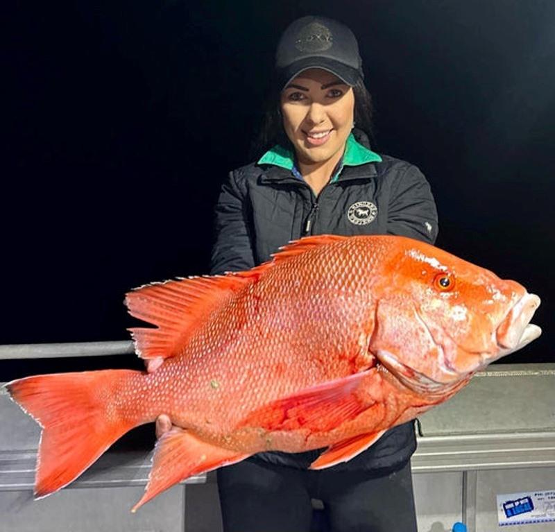 Bree with one of the reds she managed to get past the men in grey suits. Great fish Bree - photo © Fisho's Tackle World