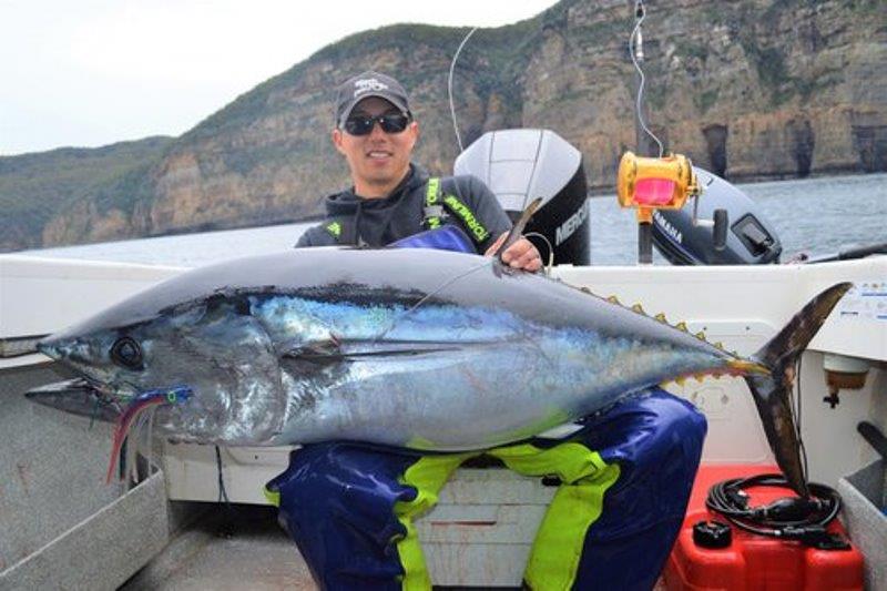 Jonah Yick with an approx. 60kg SBT caught in Munroes on the BMT Flea XT Dr Evil skirt - photo © Spot On Fishing Hobart