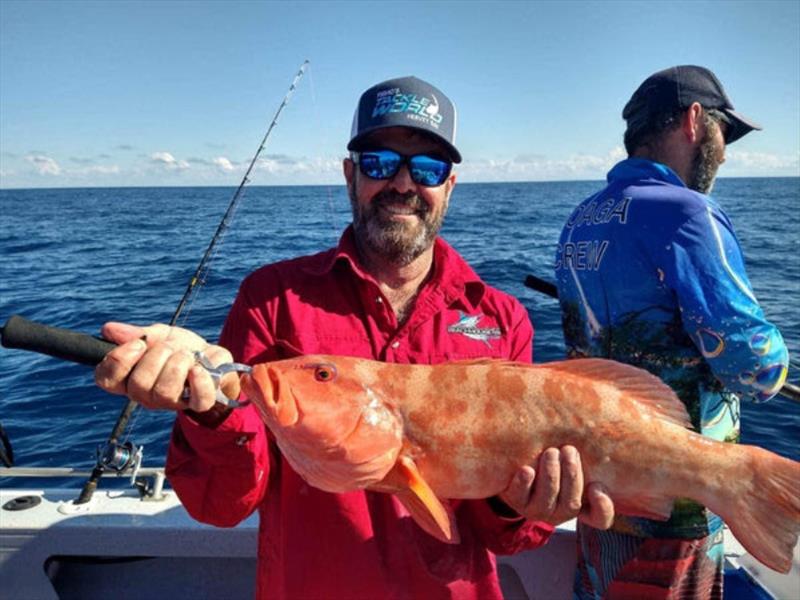 Terry Clayton with a beaut trout from a recent trip aboard Truansea Charters out of Bundy - photo © Fisho's Tackle World