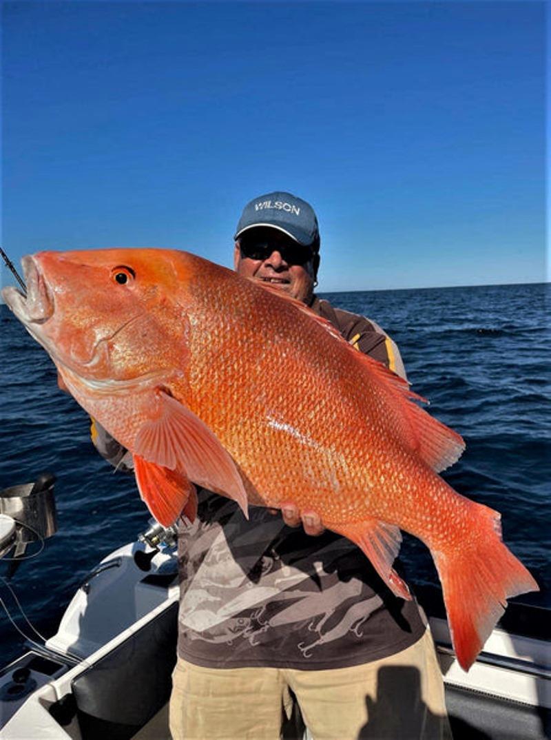 Dicko from L Wilson & Co showing how it's done during the Rainbow Beach Classic photo copyright Fisho's Tackle World taken at  and featuring the Fishing boat class