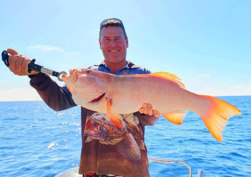 Matt Cawley with a ripper trout from the Gutters aboard Hot Reels - photo © Fisho's Tackle World