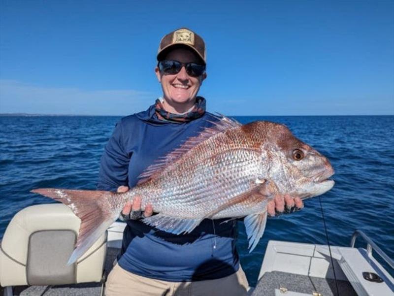 Out-stretched arms aren't required when your fish is big enough. That's a ripper snapper Keira. Well done - photo © Fisho's Tackle World