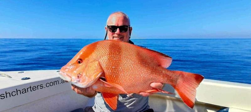 A nice little red for a happy chap aboard Hot Reels. Tough conditions eh - photo © Fisho's Tackle World