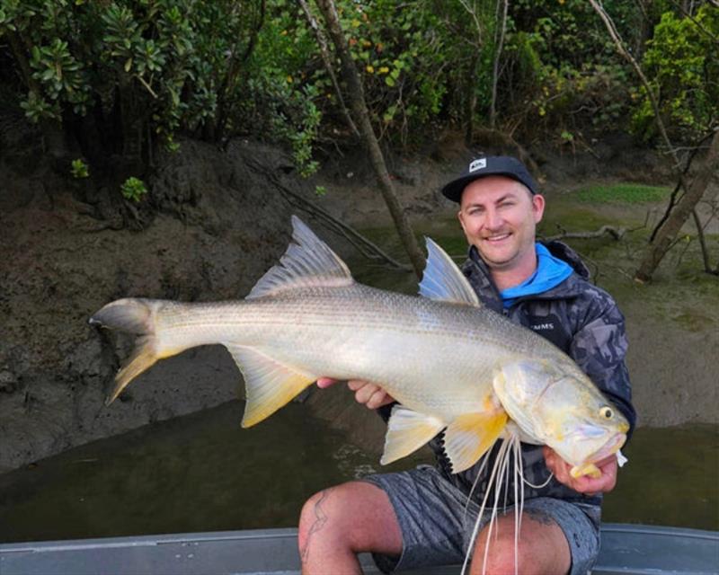 Staff member Jacko with a nice thready from the Mary - photo © Fisho's Tackle World