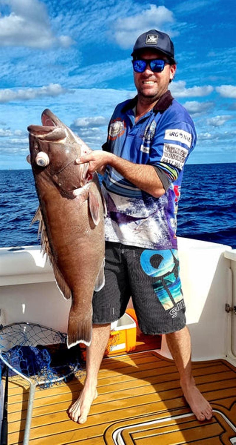 Dan hauled a decent bar cod up from the depths over the shelf recently - photo © Fisho's Tackle World