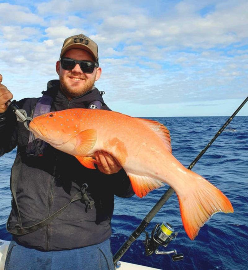 A happy Hot Reels charter client with a northern bay trout - photo © Fisho's Tackle World