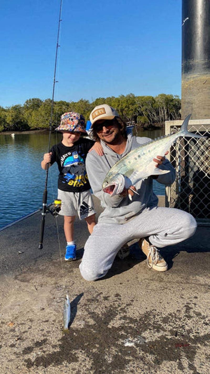 Kane with an estuary queenie, and his son with a pike. Queenies love to eat pike, as do all large predators - photo © Fisho's Tackle World