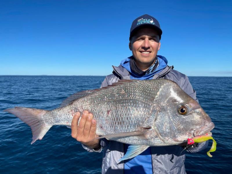 Dan with another quality Platypus Bay snapper. A Zman 5in Curly Tail in Electric Chicken got the bite - photo © Fisho's Tackle World