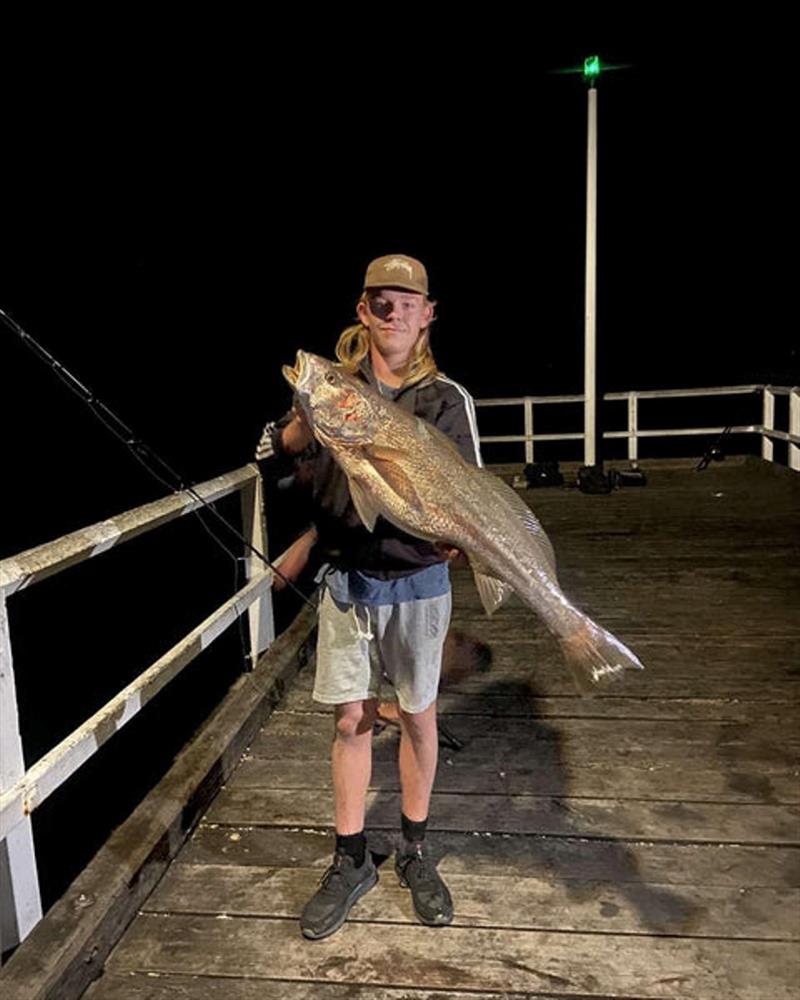 Night time is jewie time on the Urangan Pier. Jesse with a recent capture - photo © Fisho's Tackle World