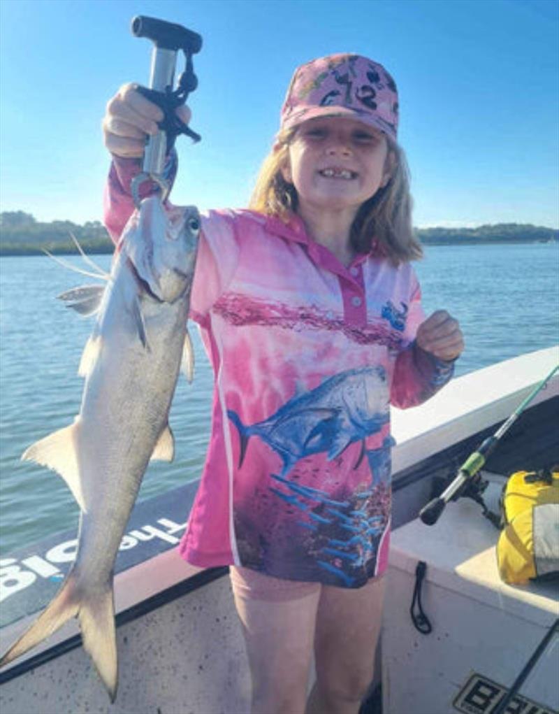 Blue salmon are great fun for the kids. Avalon is all smiles as she shows off her recent capture - photo © Fisho's Tackle World