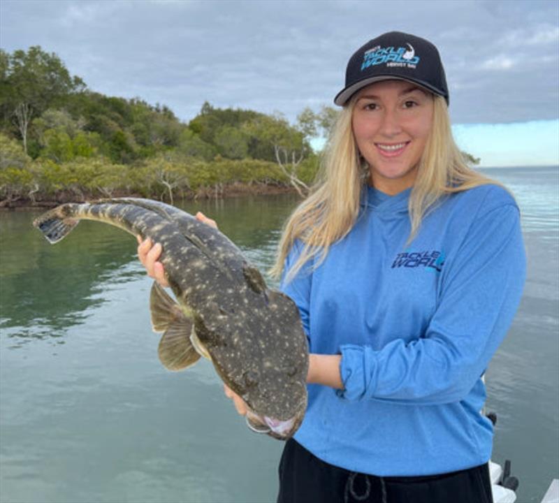 When the tide is in, get up on the flats near the mangroves or some rocks and the flatties will keep coming. Christie with a ripper - photo © Fisho's Tackle World