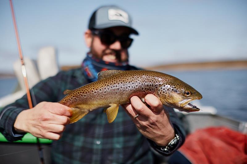 Phil with a galaxias feeder from Great Lake - photo © Spot On Fishing Hobart