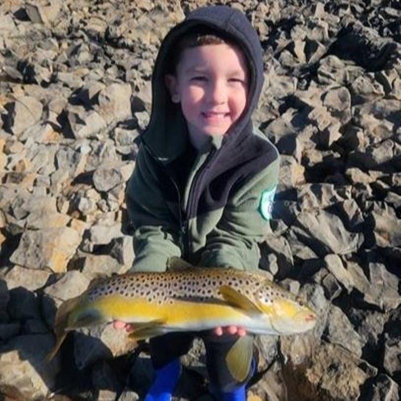 Finn Harris with some great lake browns - photo © Spot On Fishing Hobart