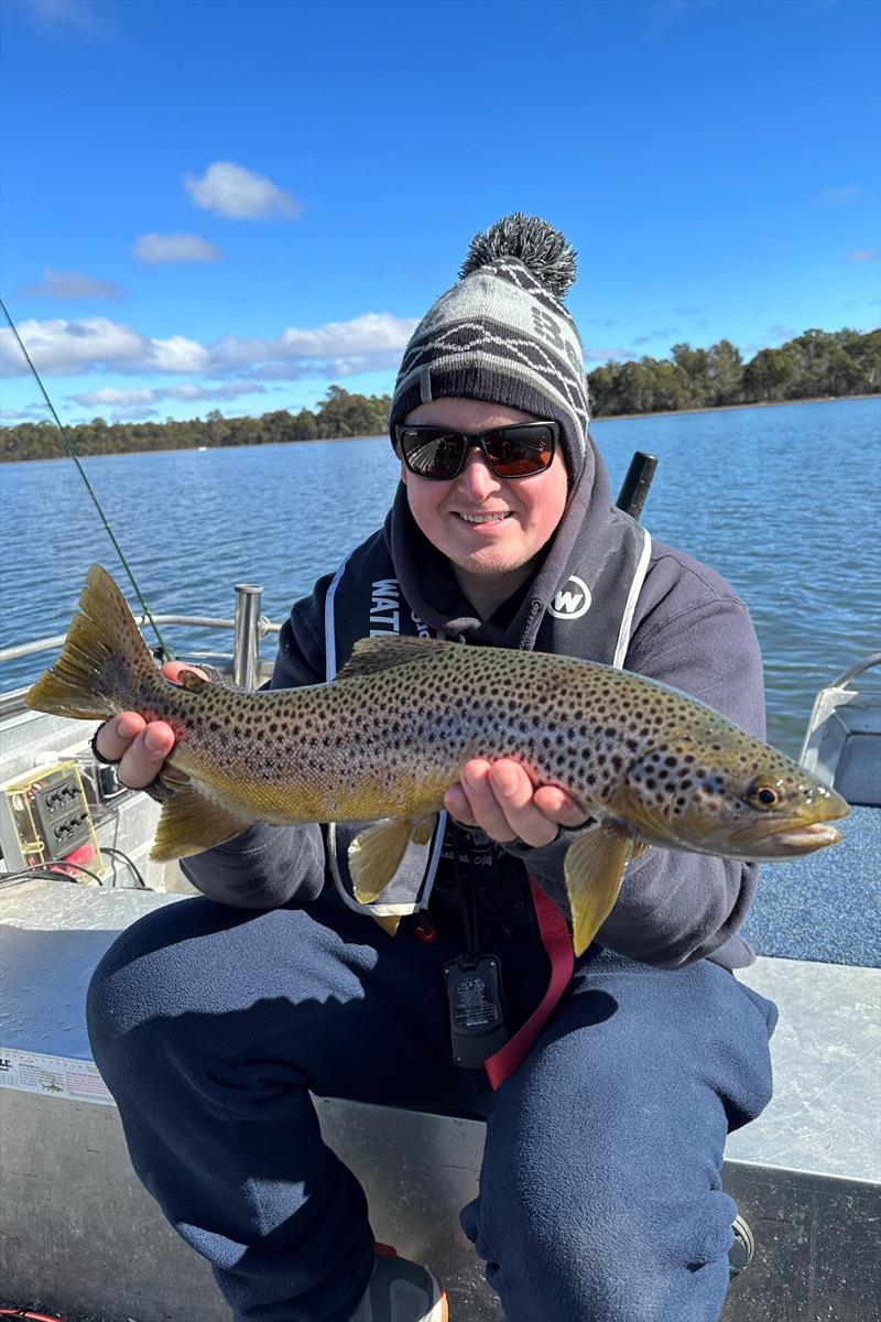 Greeny sneaking out between changing nappies to snag a few on Penstock - photo © Spot On Fishing Hobart