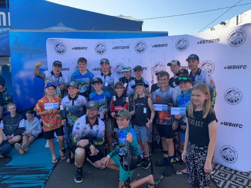 It was smiles all round for the junior prizewinners at the recent Woodgate fishing comp - photo © Fisho's Tackle World