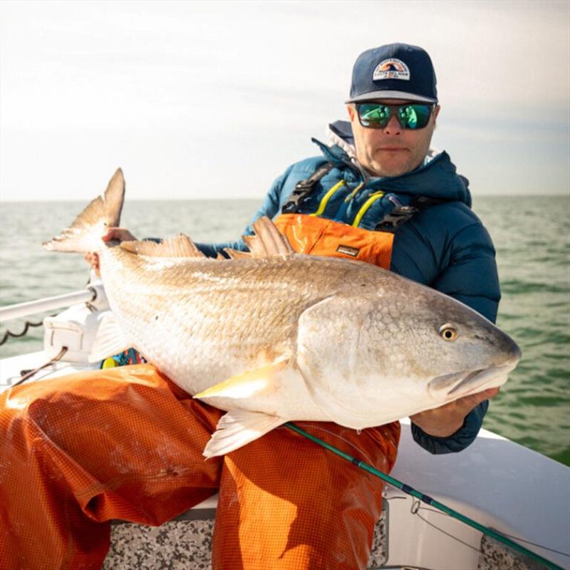 TFO Advisor Blane Chocklett with a large bull red caught on the 10wt Blitz photo copyright Tom Wetherington taken at  and featuring the Fishing boat class