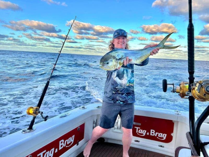 Tom with a nice little dolly, or mahi mahi, taken as bycatch whilst targeting marlin offshore last week - photo © Fisho's Tackle World