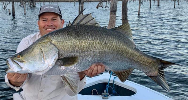 Brett's 99cm Mondy barra is an example of the 'average' fish in the lake at the moment - photo © Fisho's Tackle World