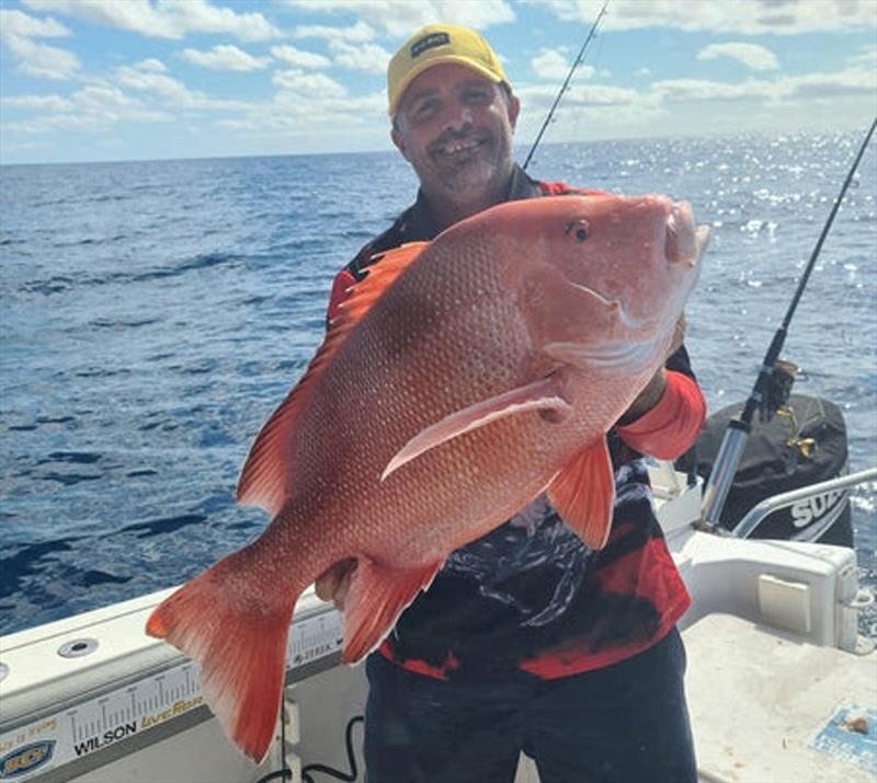 Luke is a local with swags of experience on the briny. Rewards such as this big red don't come as easily as they used to, eh Luke - photo © Fisho's Tackle World