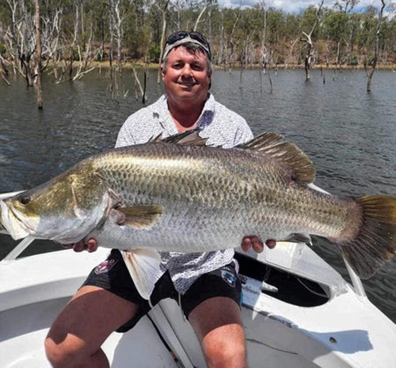 Darren O'toole with a beaut impoundment barra. Fish such as these will be the focus of many fishos during the barramundi closed season - photo © Fisho's Tackle World