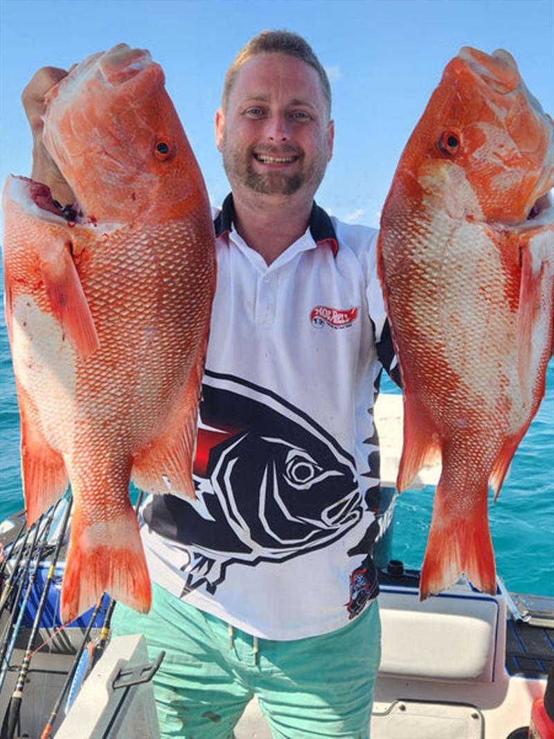 Ado picked up a couple of legal reds amongst a school of smaller fish offshore recently. Seeking them out in shallower water helped evade the sharks - photo © Fisho's Tackle World