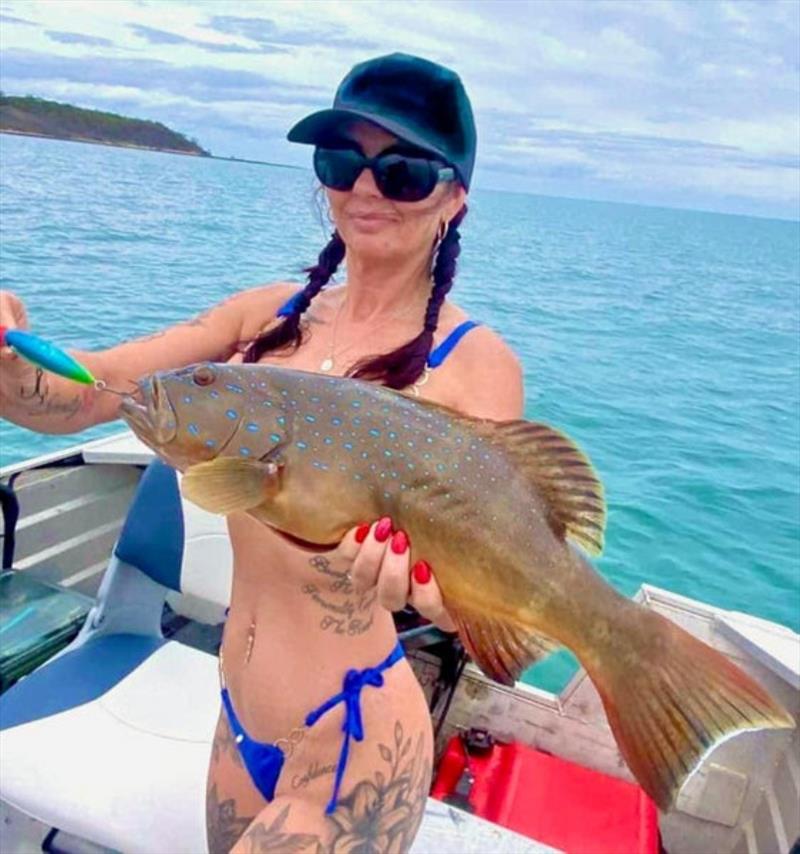 Mel with yet another nice trout from inshore waters. Drop in for a Fisho's cap on us Mel - photo © Fisho's Tackle World