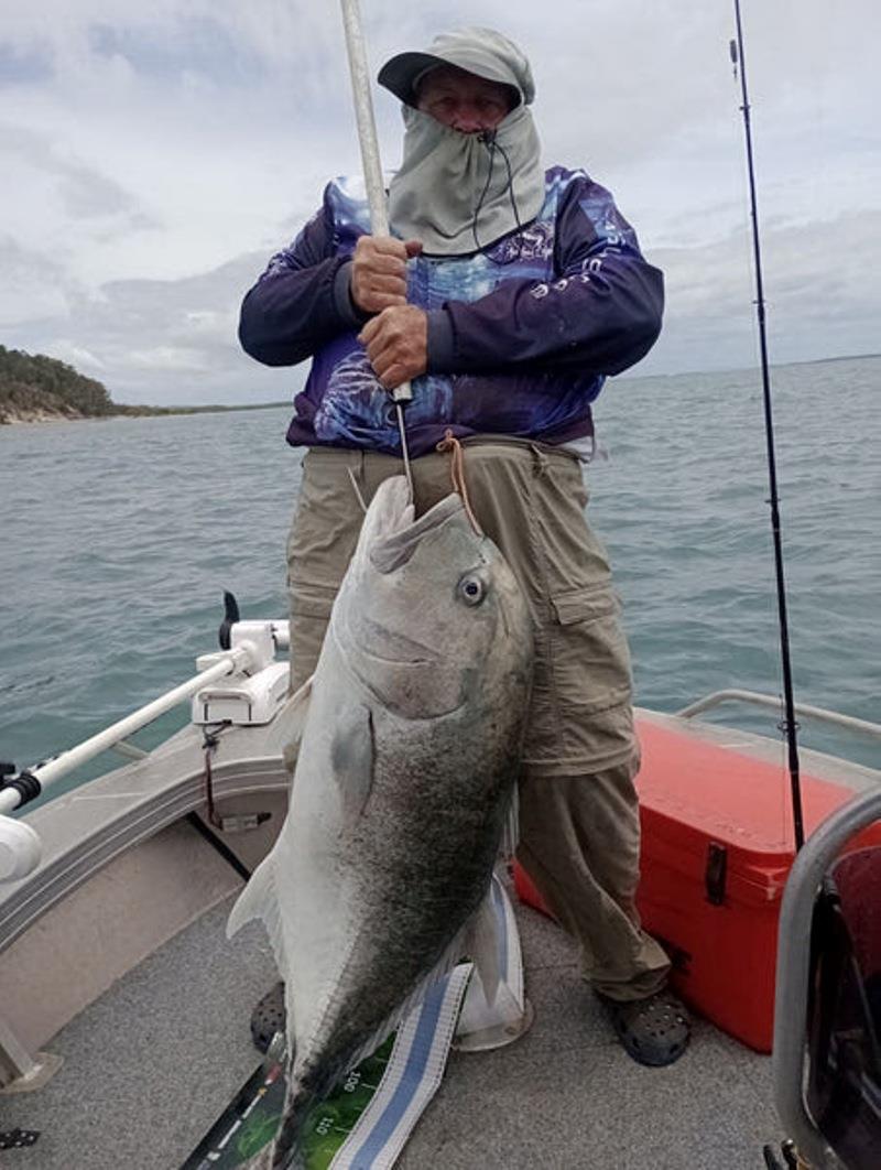 A member of the River Heads Fishing Club with a big GT. Be prepared for encounters with these beasts over summer - photo © Fisho's Tackle World