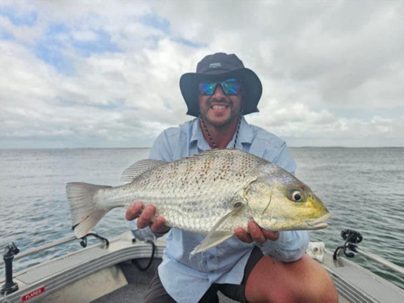 Darcy caught this beaut grunter recently. This is prime time for our near shore waters, the flats, and the lower reaches of our creeks and rivers - photo © Fisho's Tackle World