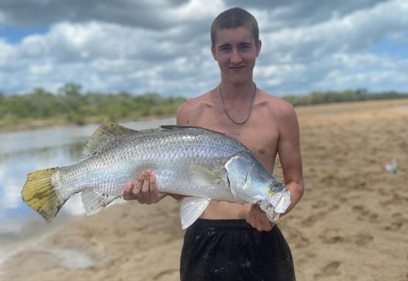 Barra can be caught wandering the local creek banks flicking lures. Doulin was chuffed with this nice salty - photo © Fisho's Tackle World