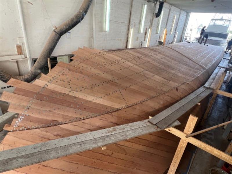 Hull #11 - First bottom layer on - photo © Michael Rybovich & Sons