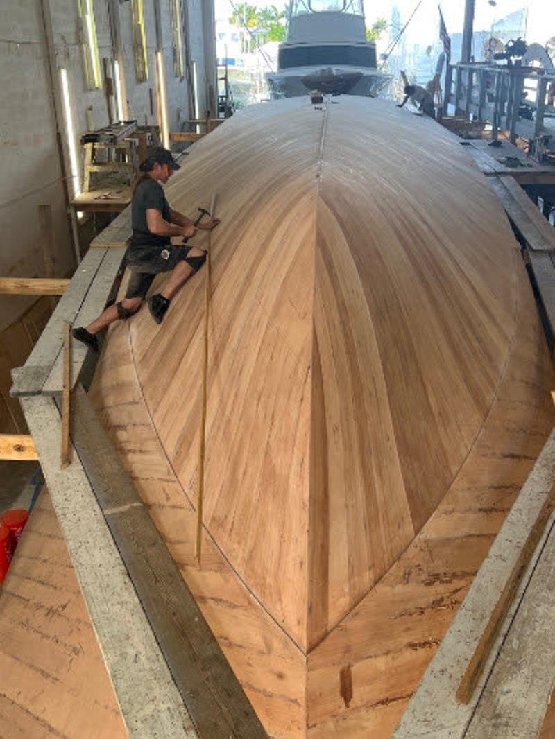 Hull #11 - Second bottom layer complete - photo © Michael Rybovich & Sons